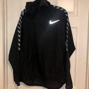 Nike “Impossibly Light” pullover running jacket. L